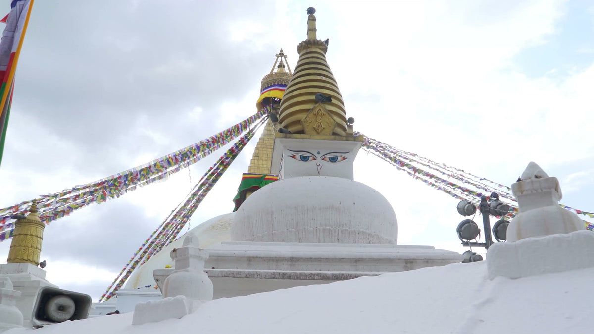 Boudhanath stupa and prayer flags in Kathmandu, Nepal.