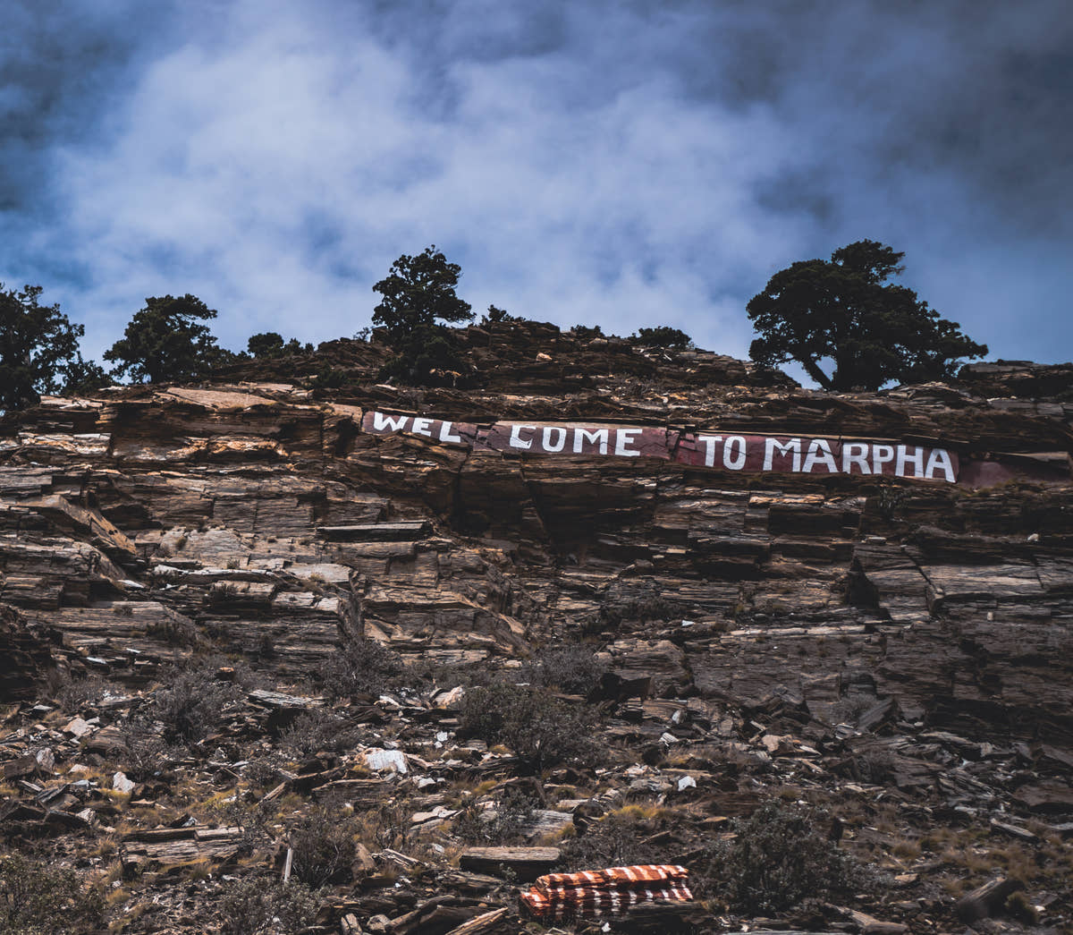 Welcome sign on the cliff above Marpha village in the Kali Gandaki valley, Nepal
