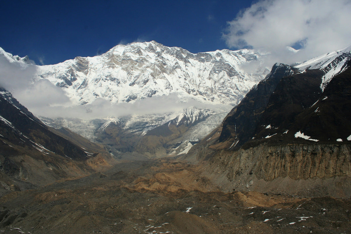 Snow-capped mountain range with a clear blue sky